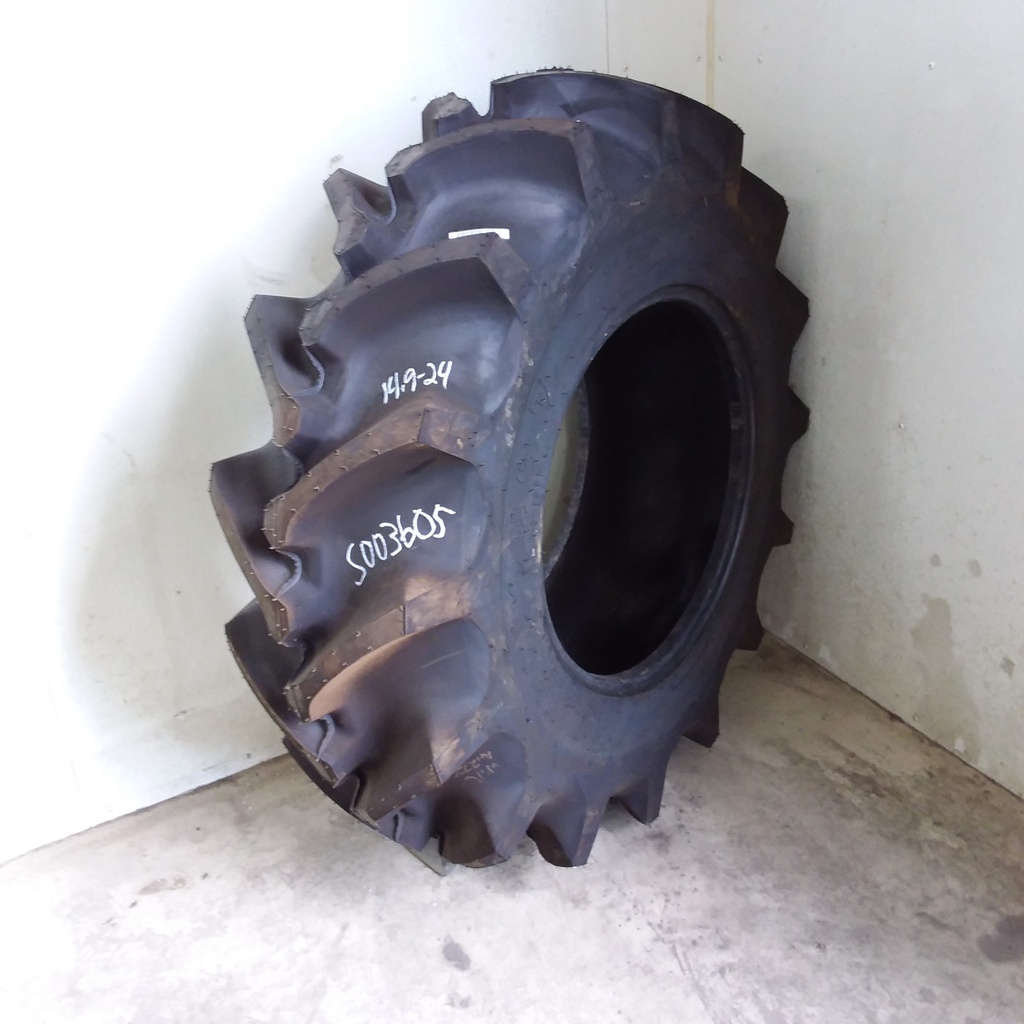 14.9/-24 Firestone Champion Spade Grip R-2, F (12 Ply) 99%