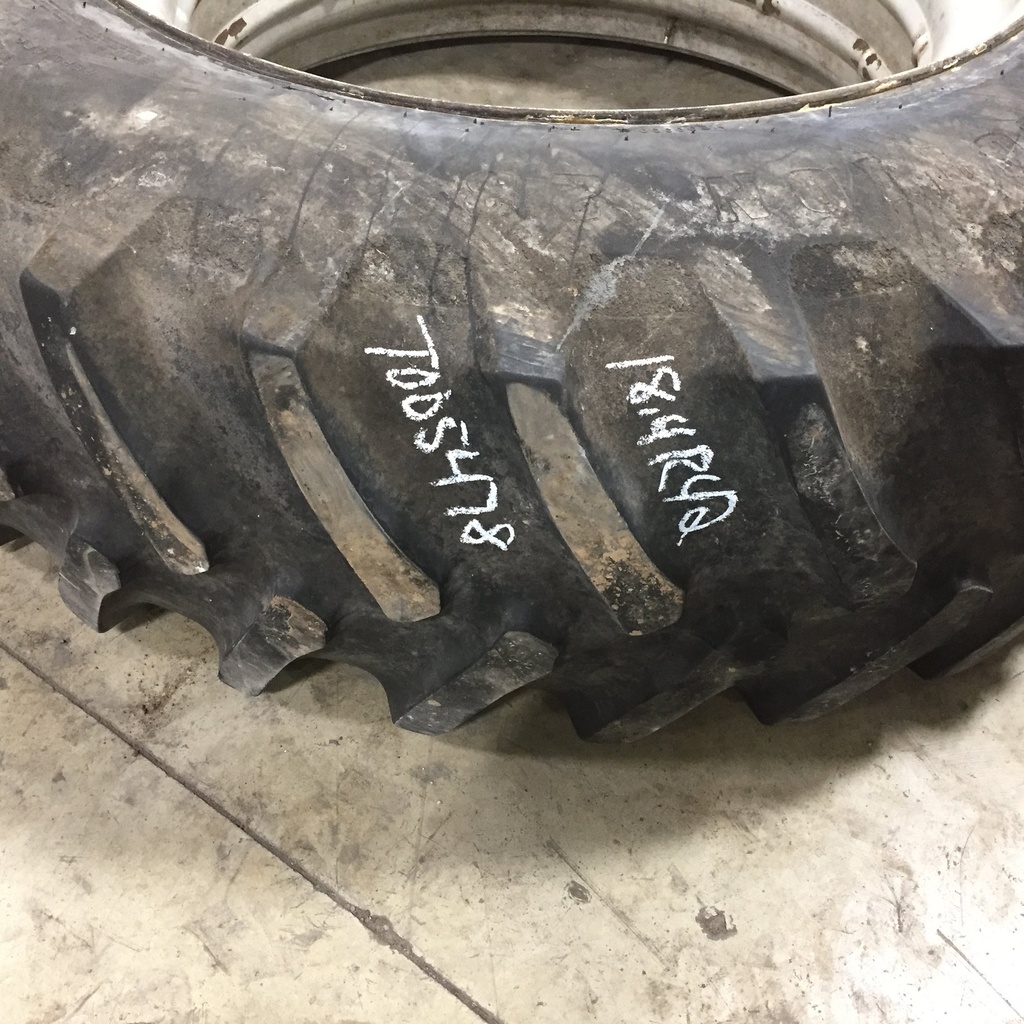 18.4/R42 Firestone Radial All Traction 23 R-1 on John Deere Yellow 0-Hole Double Bevel 38" Cast 65%