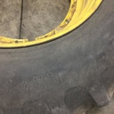 20.8/R42 Firestone Radial All Traction 23 R-1 on John Deere Yellow 12-Hole Stub Disc 55%