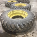 20.8/R42 Firestone Radial All Traction 23 R-1 on John Deere Yellow 12-Hole Stub Disc 55%