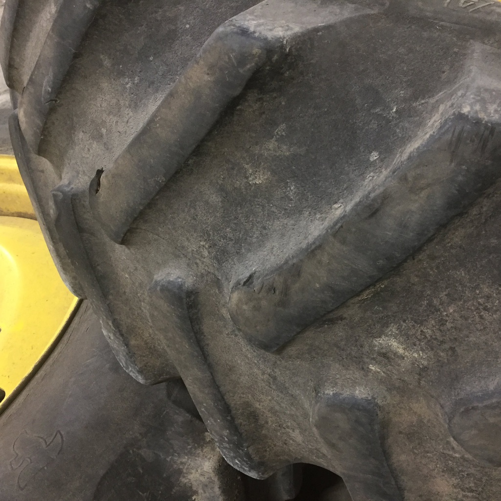 20.8/R42 Firestone Radial All Traction 23 R-1 on John Deere Yellow 10-Hole Formed Plate W/Weight Holes 55%