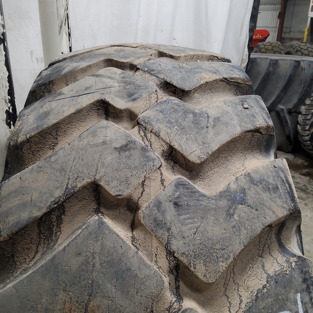 20.5/-25 Firestone Super Rock Grip E-3/L-3, H (16 Ply) 80%