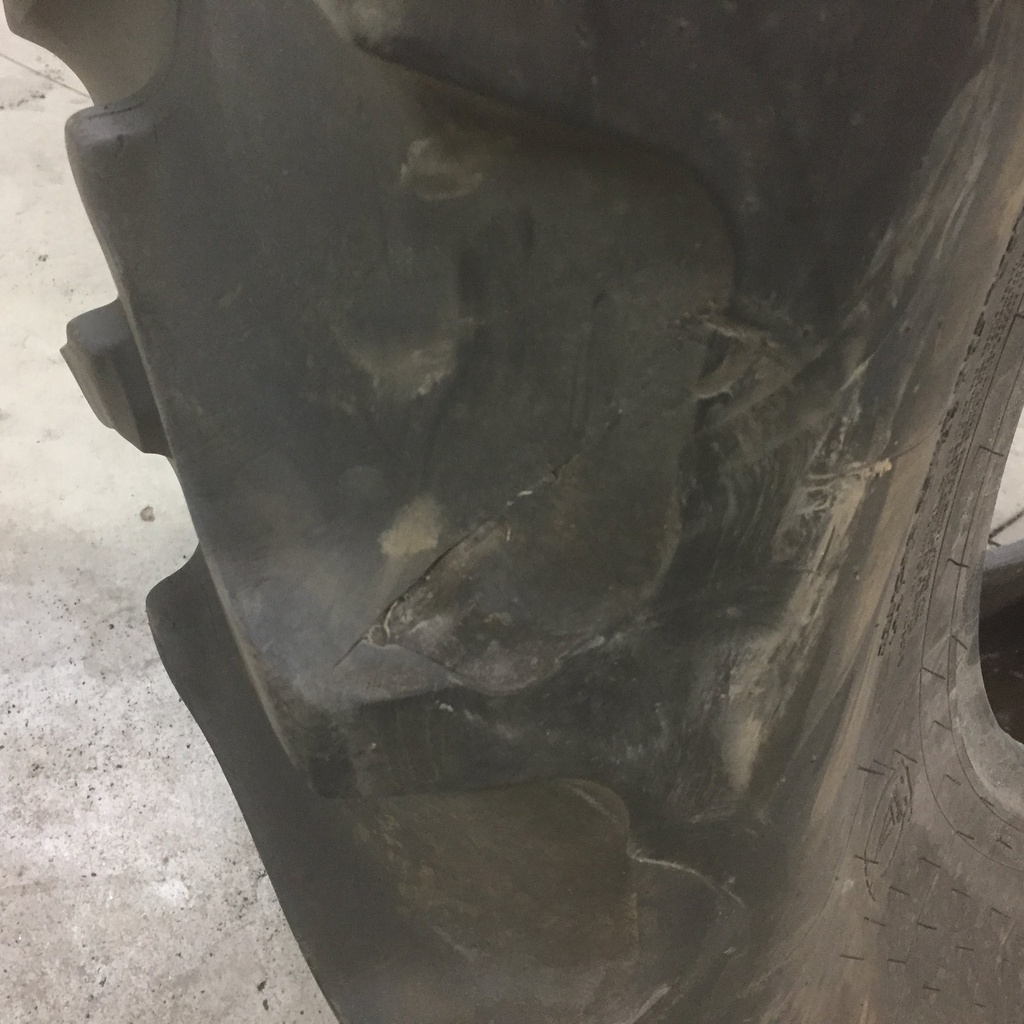 18.4/-30 Firestone Super All Traction II 23 R-1, D (8 Ply) 60%