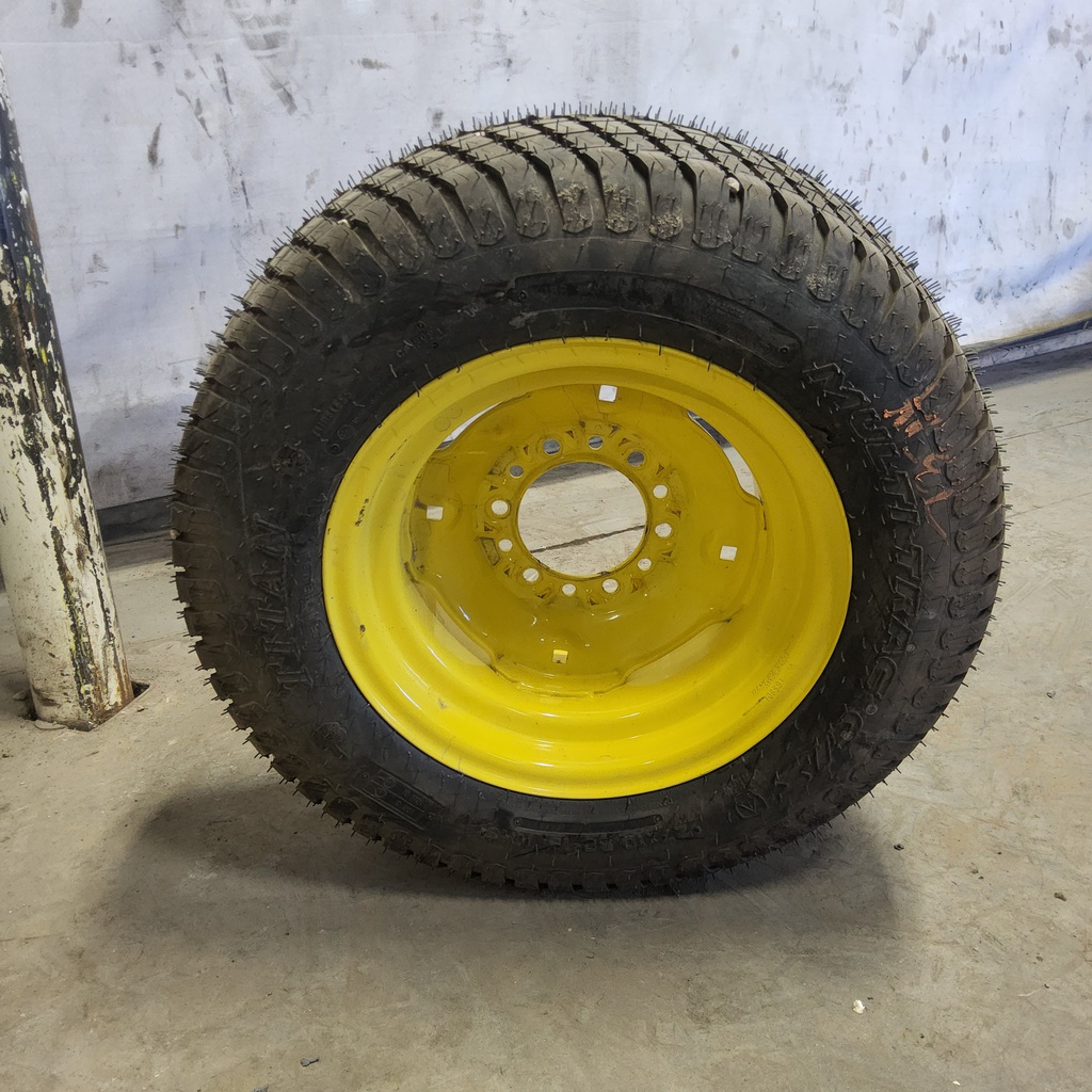 27/10.50-15 Titan Farm Multi Trac C/S NHS  HF-1 on John Deere Yellow 6-Hole Implement 99%