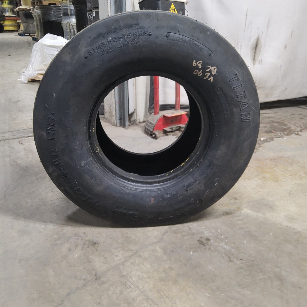 31/13.50-15 Titan Farm Flo-Trac Rib HF-1 , G (14 Ply) 99%