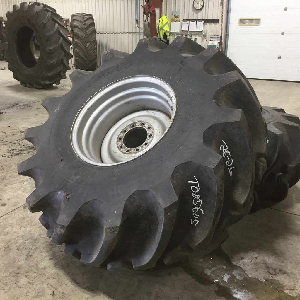 28/L-26 Firestone Champion Spade Grip R-2, H (16 Ply) 80%