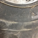 28/L-26 Firestone Champion Spade Grip R-2, H (16 Ply) 80%