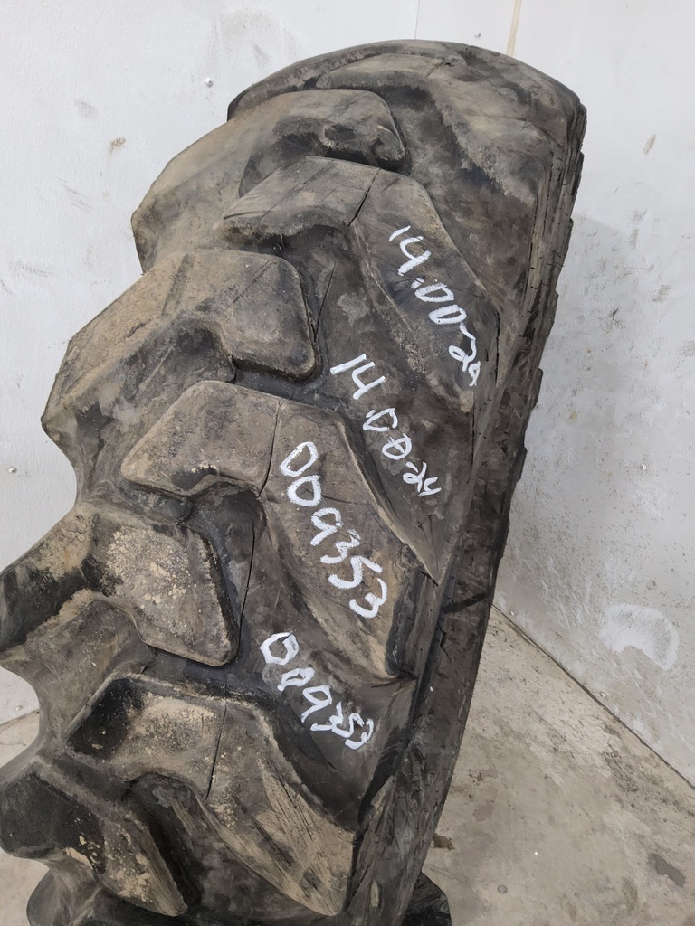 14.00/-24 Firestone Super Ground Grip G-2 , H (16 Ply) 80%