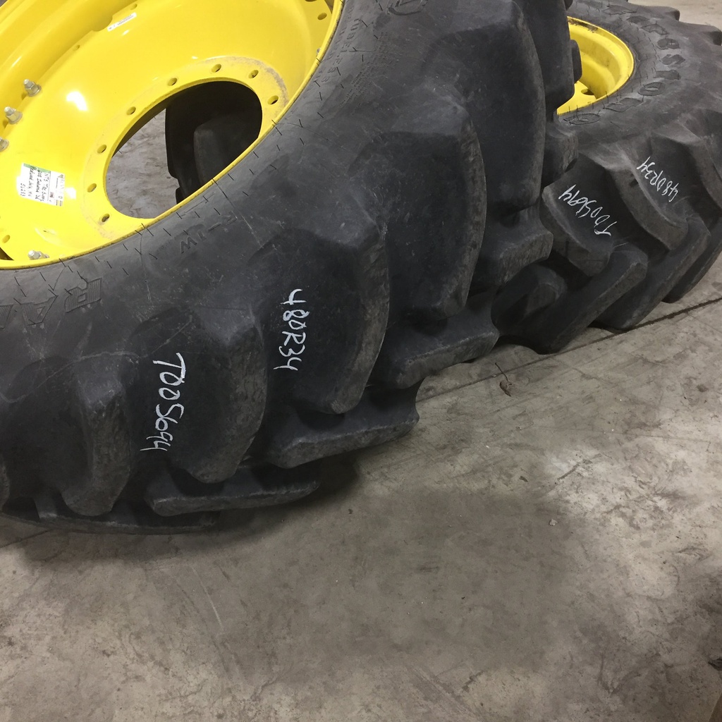 480/70R34 Firestone Radial 9000 R-1W on John Deere Yellow 12-Hole Waffle Wheel (Groups of 3 bolts) 80%