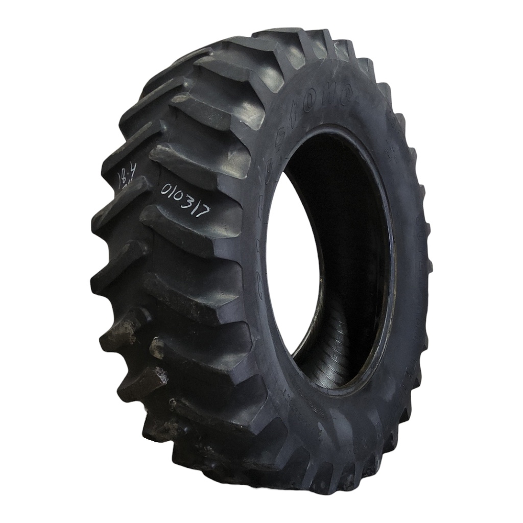 18.4/-34 Firestone Super All Traction 23 R-1 , D (8 Ply) 55%