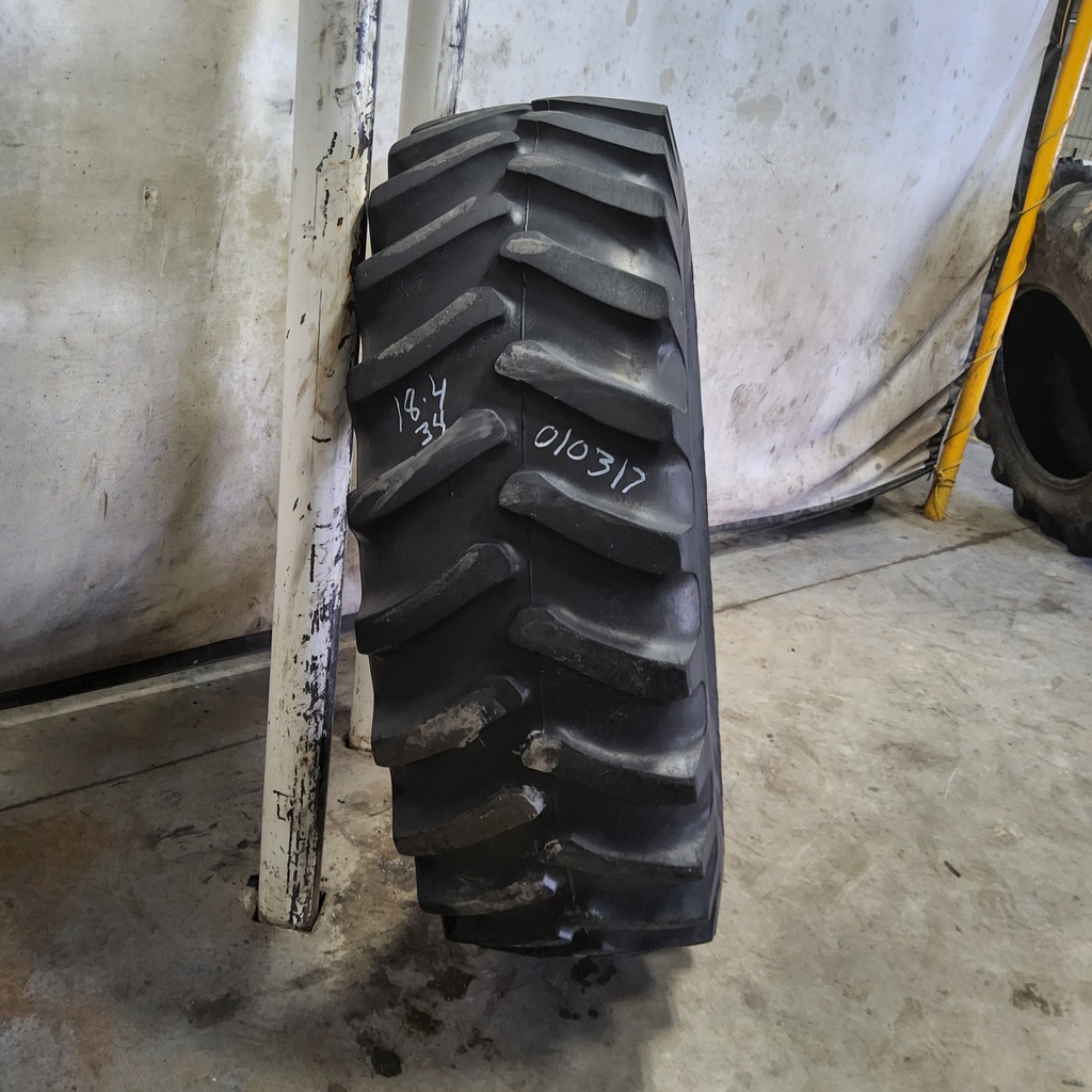 18.4/-34 Firestone Super All Traction 23 R-1 , D (8 Ply) 55%