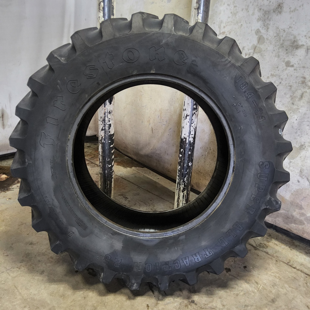 18.4/-34 Firestone Super All Traction 23 R-1 , D (8 Ply) 55%
