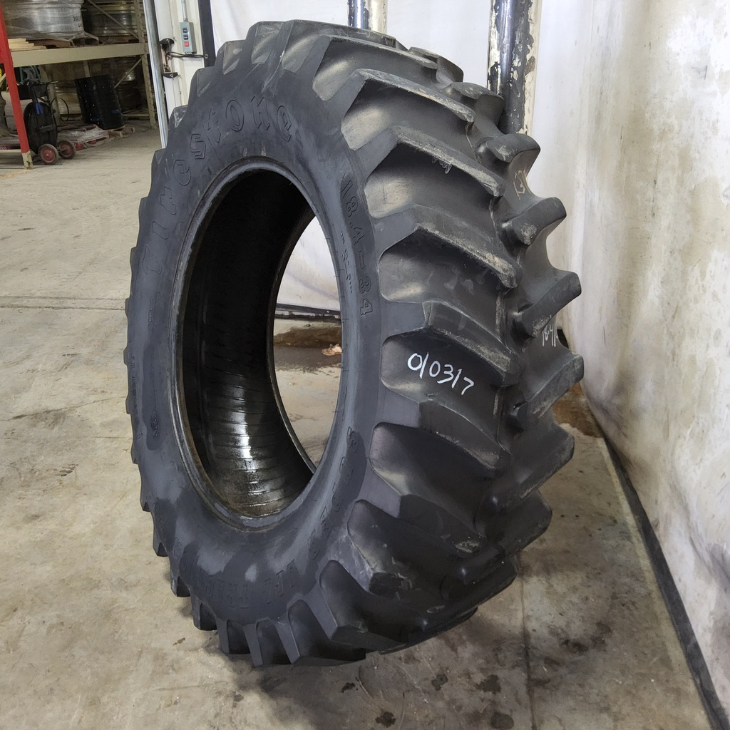 18.4/-34 Firestone Super All Traction 23 R-1 , D (8 Ply) 55%