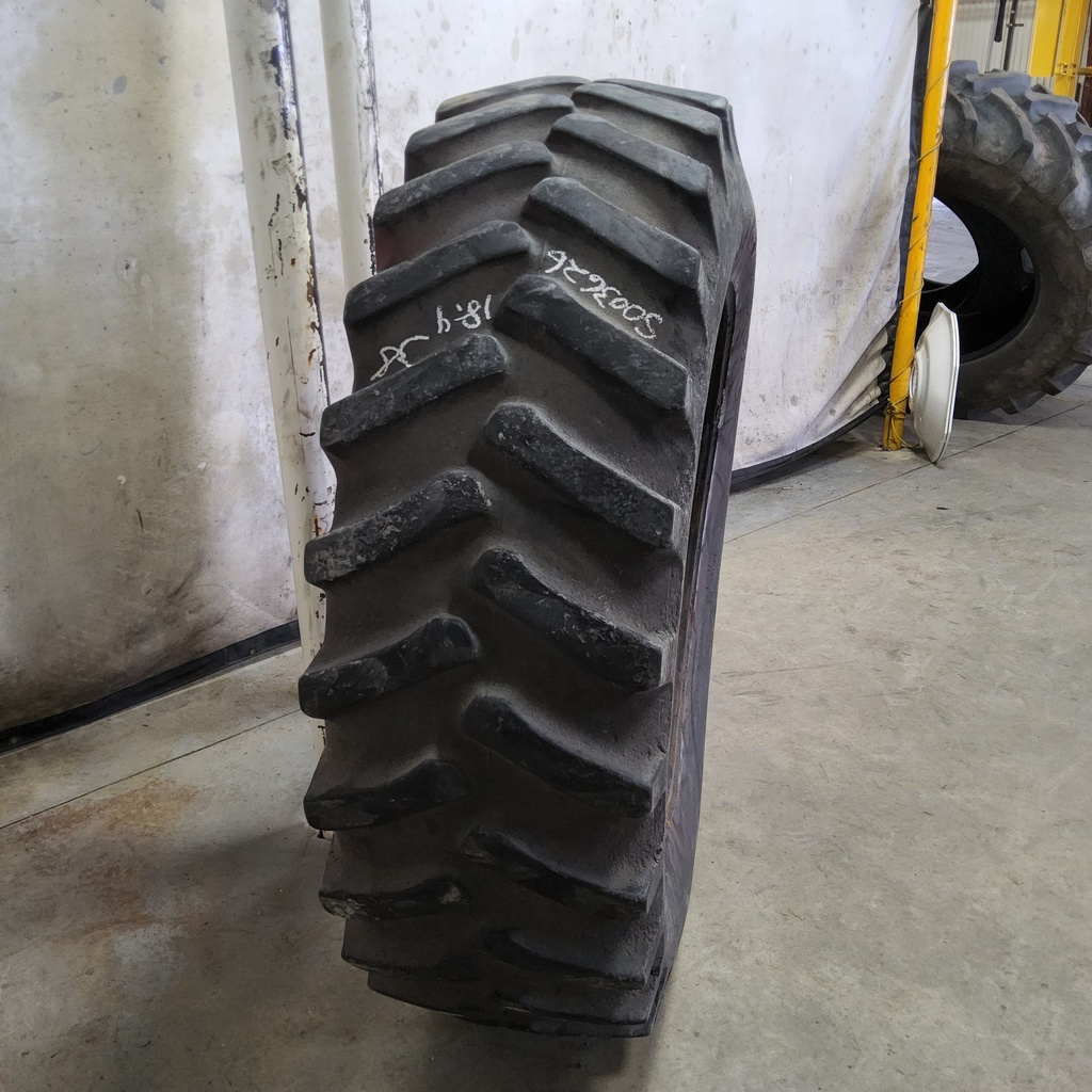 18.4/-38 Firestone Super All Traction 23 R-1 , D (8 Ply) 55%