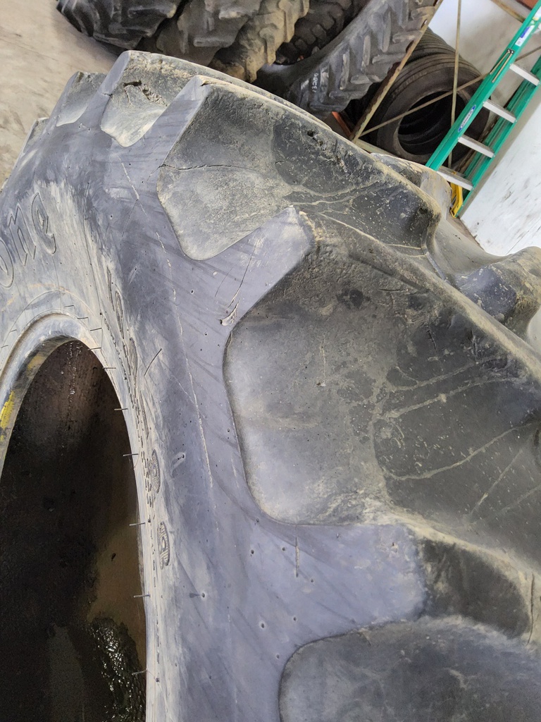 16.9/-28 Firestone Super All Traction II 23 R-1 A8, C (6 Ply) 75%