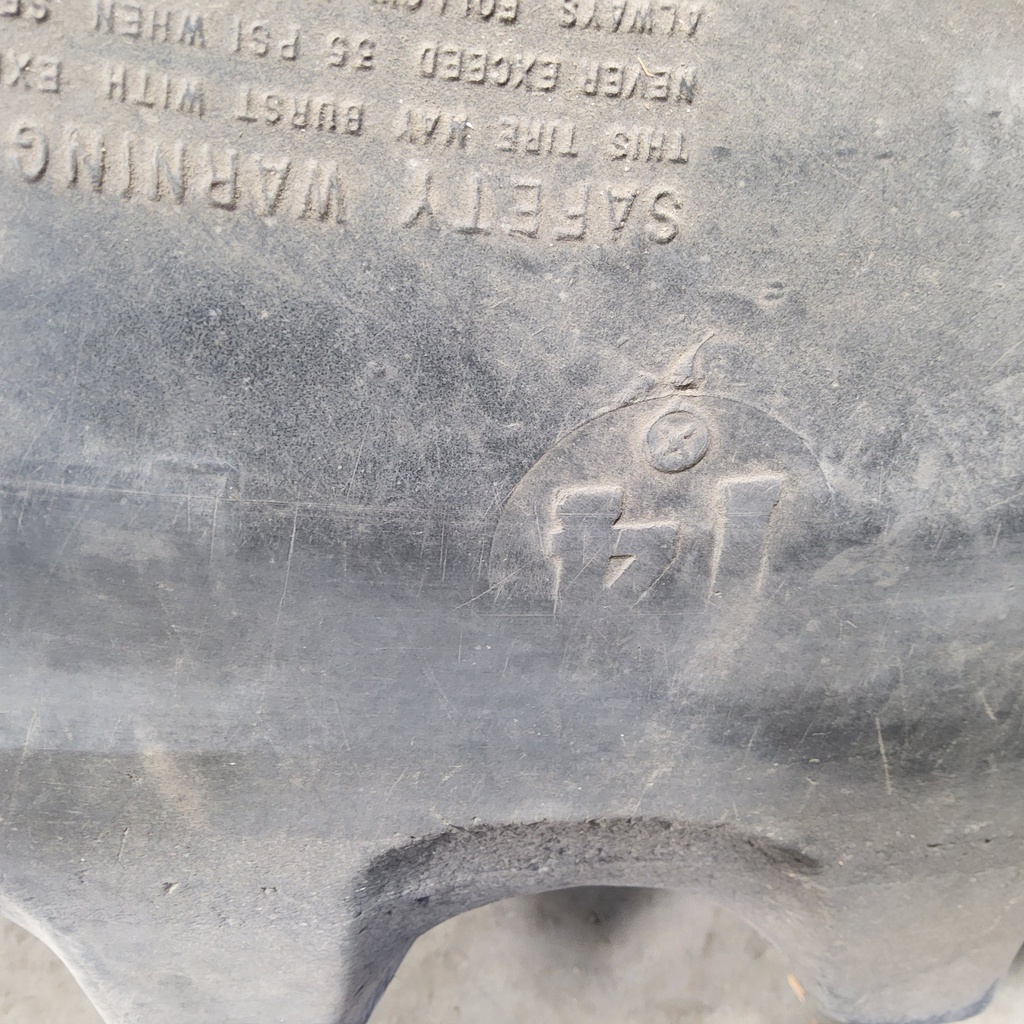 18.4/-38 Firestone All Traction 23 R-1 , G (14 Ply)