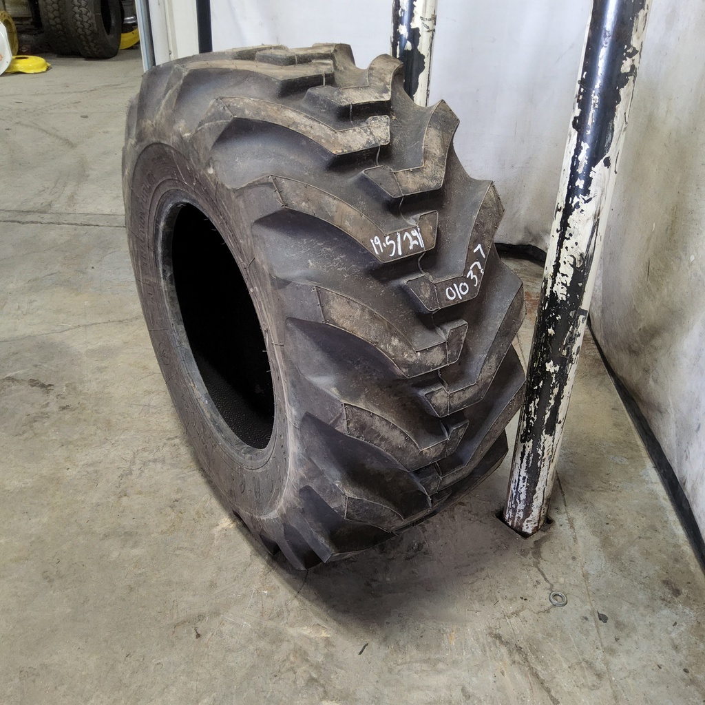 19.5/L-24 Firestone All Traction Utility R-4 , E (10 Ply) 99%