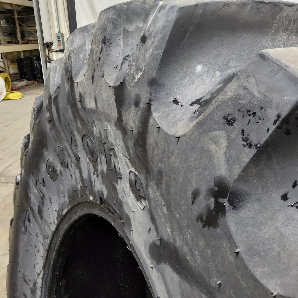 23.1/-26 Firestone Super All Traction 23 R-1 , F (12 Ply) 75%