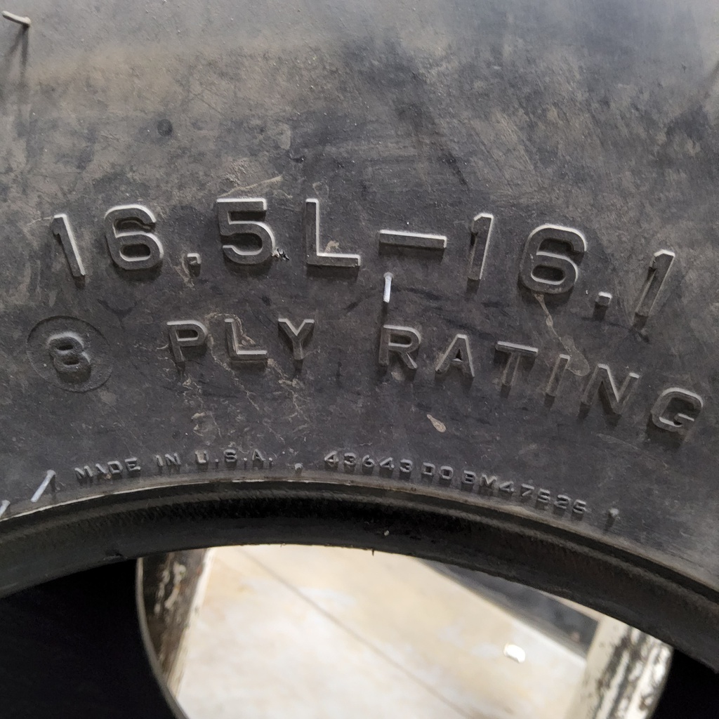 16.5/L-16.1 Firestone Champion Guide Grip 4-Rib SS F-2M , D (8 Ply) 85%