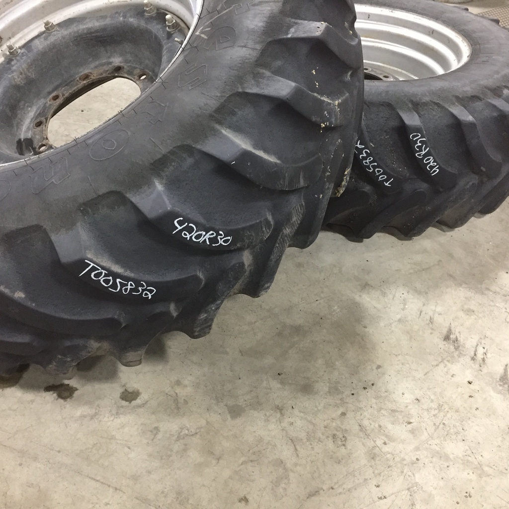420/90R30 Firestone Radial All Traction FWD R-1 on Case IH Silver Mist/Black 10-Hole Waffle Wheel (Groups of 2 bolts) 50%