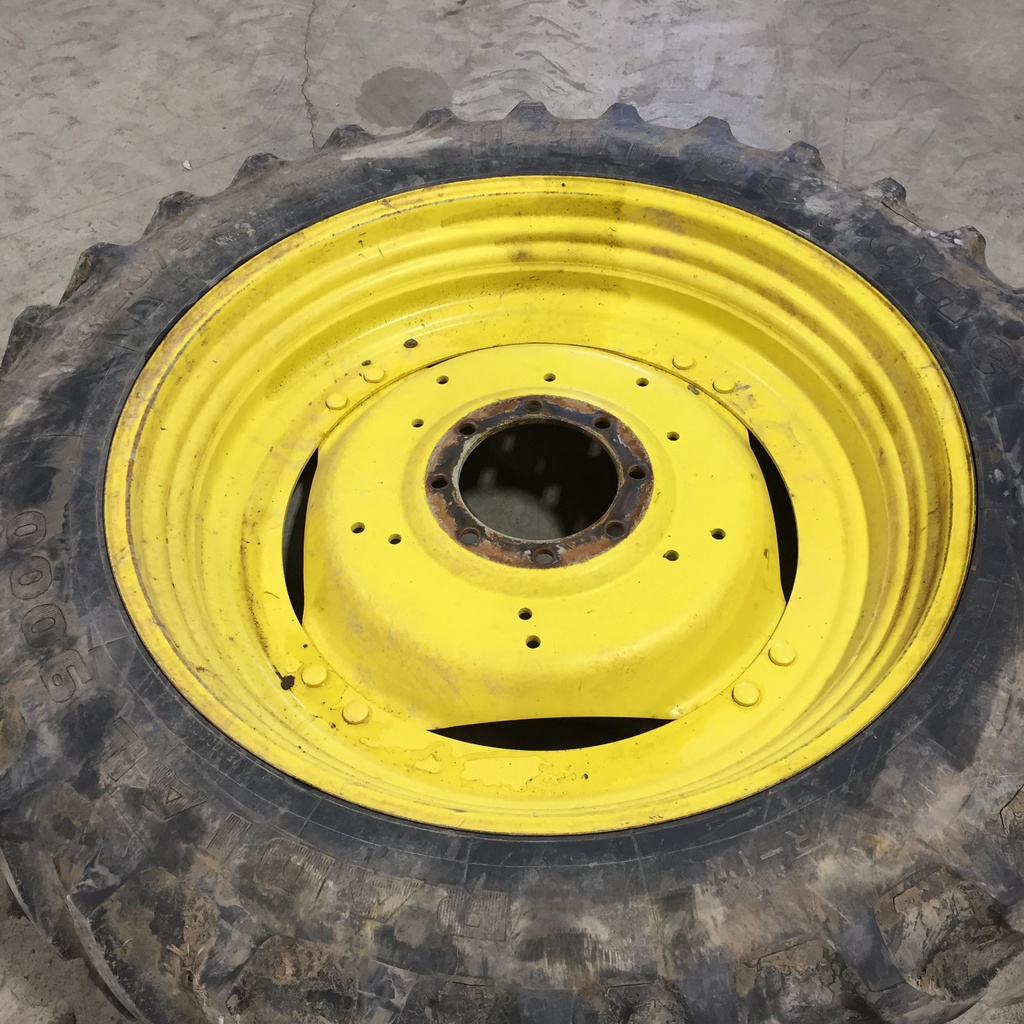 320/90R42 Firestone Radial 9000 R-1W on John Deere Yellow 8-Hole Stub Disc (groups of 2 bolts) 40%