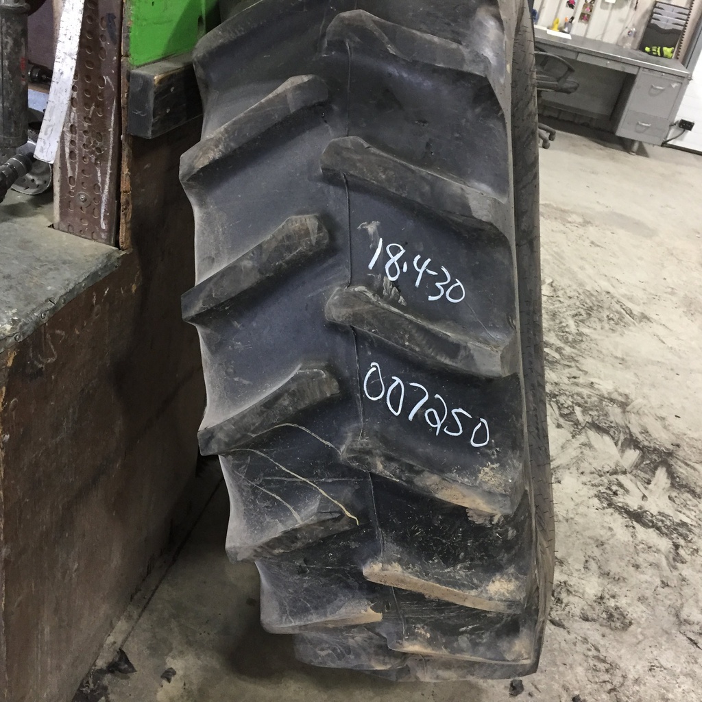 18.4/-30 Firestone Super All Traction II 23 R-1, D (8 Ply) 80%