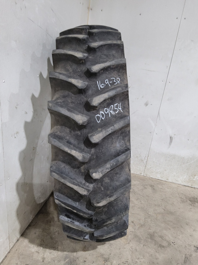 16.9/-38 Firestone Super All Traction 23 R-1 , C (6 Ply)