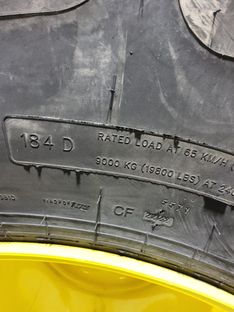 LSW 1000/45R32 Goodyear Farm Optitrac R-1W on John Deere Yellow 12-Hole Formed Plate 95%