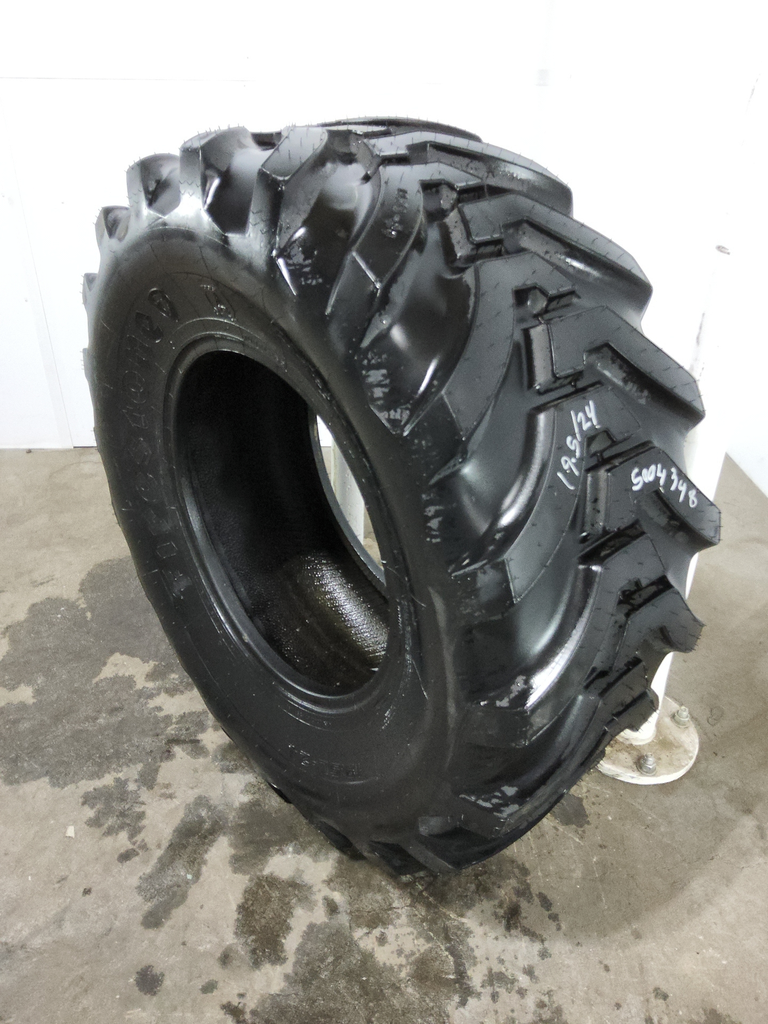 19.5/L-24 Firestone All Traction Utility R-4 , E (10 Ply) 99%