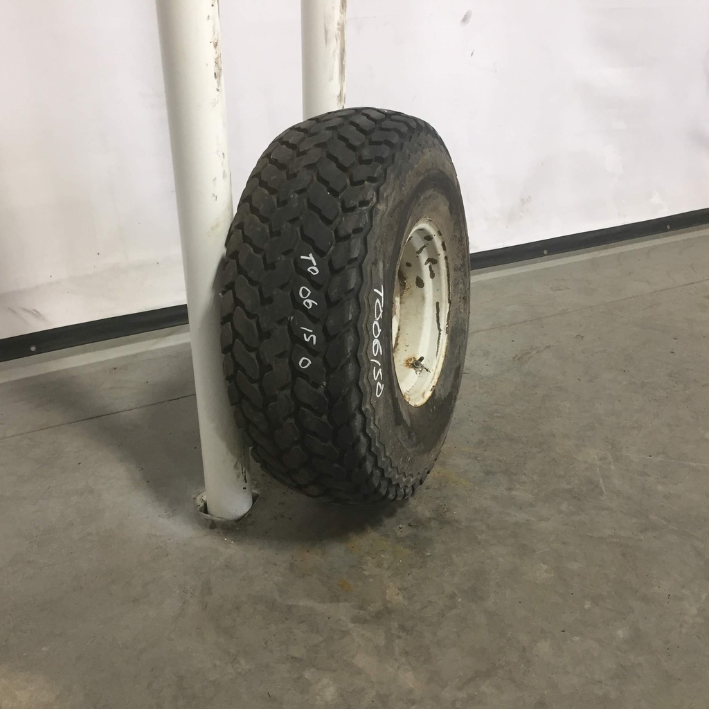 13.6/-16 Firestone Turf & Field 5-Rib R-3 on New Holland White 6-Hole Implement 90%