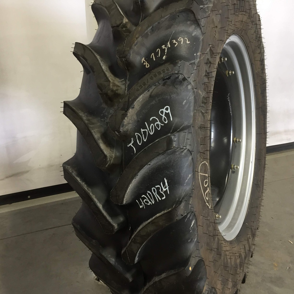 420/85R34 Firestone Radial All Traction DT R-1W on Case IH Silver Mist/Black 12-Hole Waffle Wheel (Groups of 2 bolts) 99%