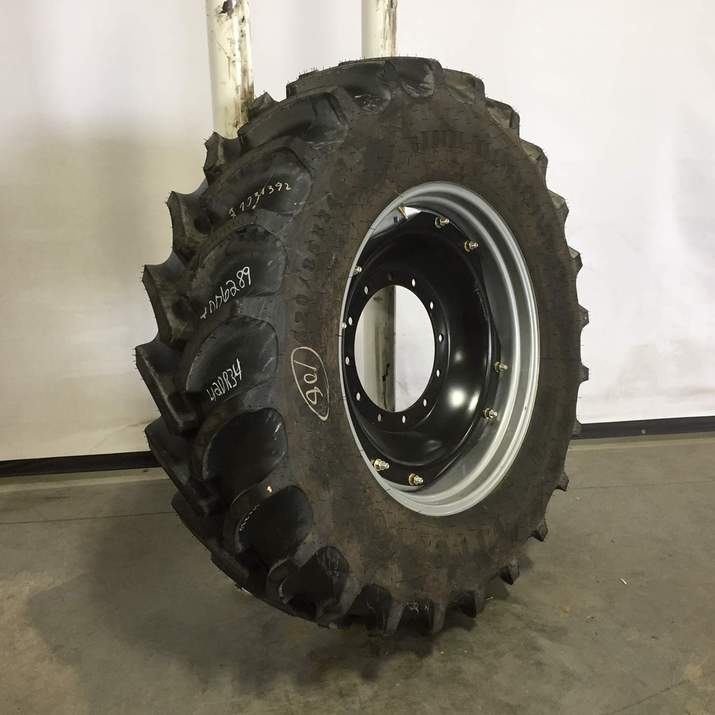 420/85R34 Firestone Radial All Traction DT R-1W on Case IH Silver Mist/Black 12-Hole Waffle Wheel (Groups of 2 bolts) 99%