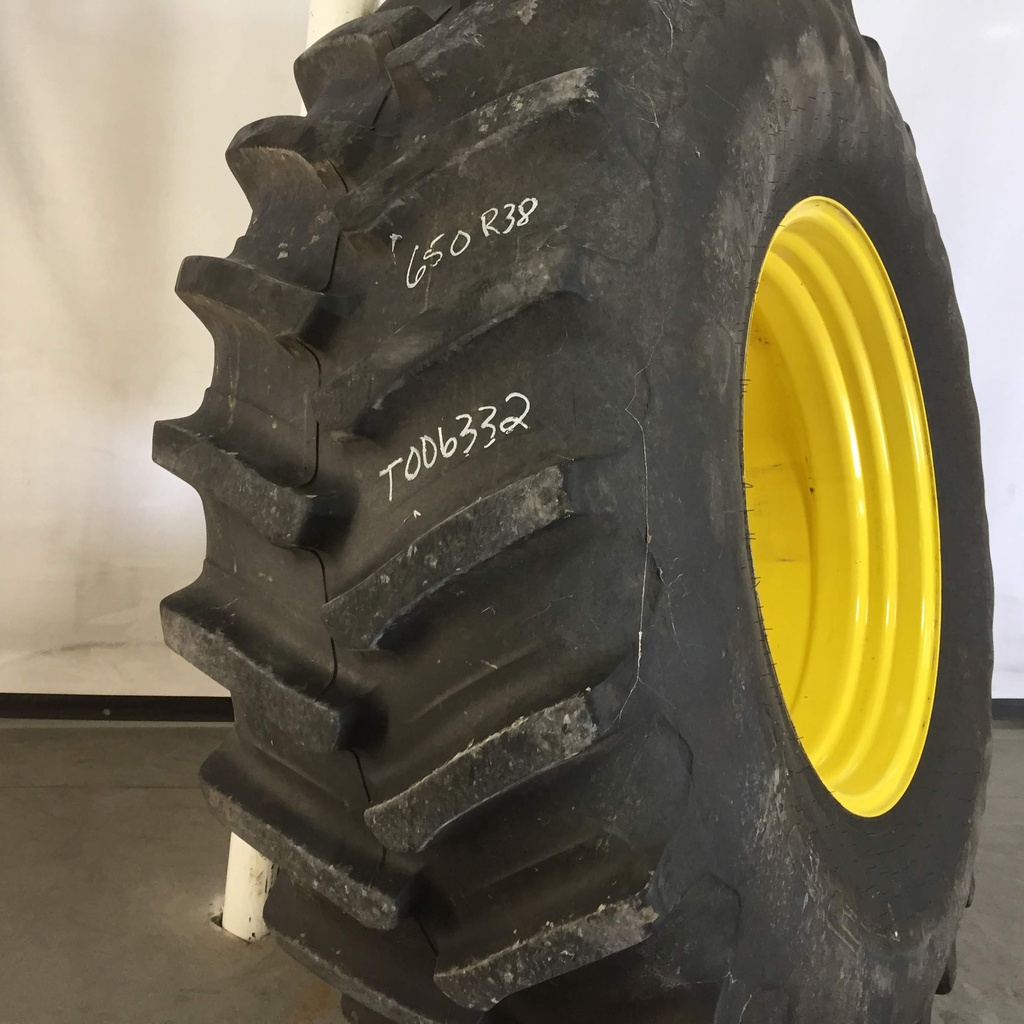 650/85R38 Firestone Radial Deep Tread 23 R-1W on John Deere Yellow 10-Hole Dolly Dual 85%