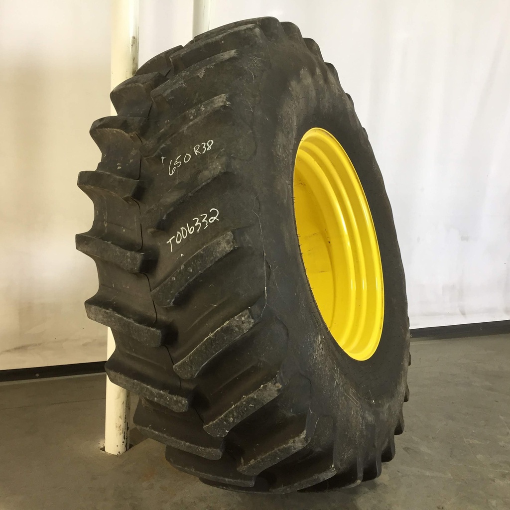 650/85R38 Firestone Radial Deep Tread 23 R-1W on John Deere Yellow 10-Hole Dolly Dual 85%