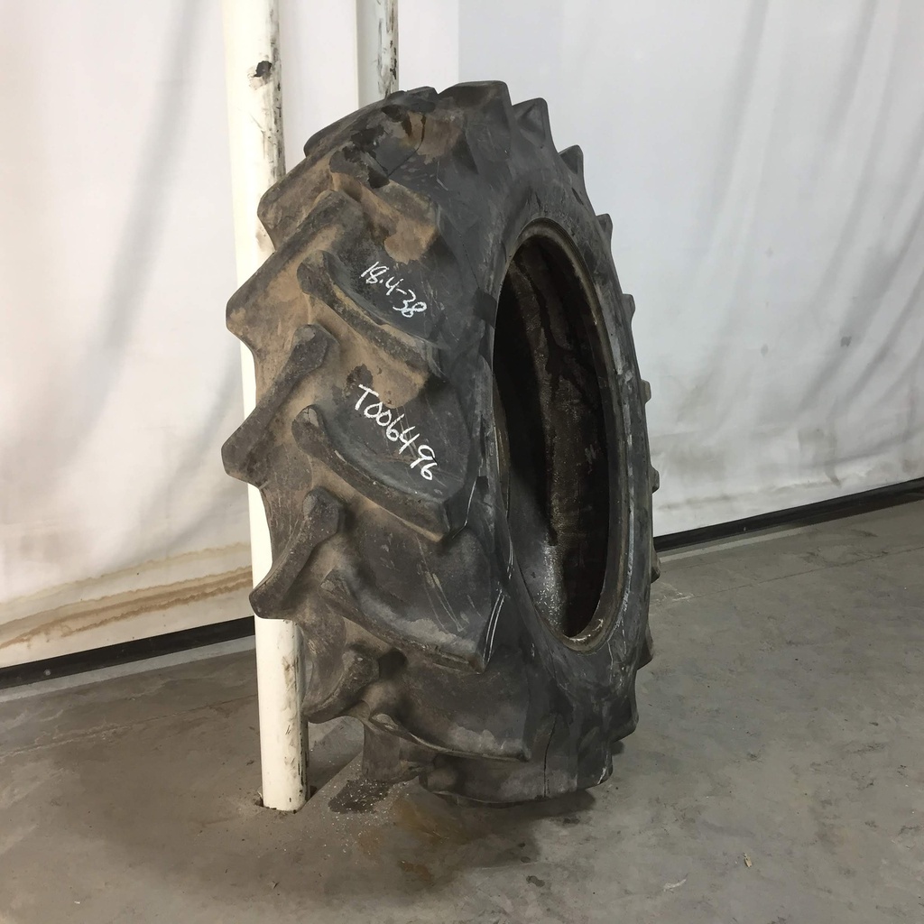 18.4/-38 Firestone Champion Spade Grip R-2, E (10 Ply) 70%