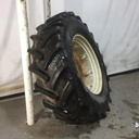 18.4/R34 Goodyear Farm Super Traction Radial R-1W on New Holland White 8-Hole Rim with Clamp/Loop Style 60%