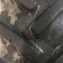 18.4/R34 Goodyear Farm Super Traction Radial R-1W on New Holland White 8-Hole Rim with Clamp/Loop Style 60%