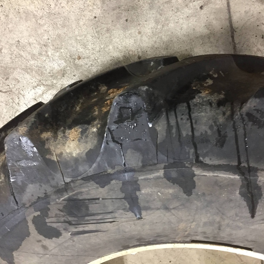 18.4/R34 Goodyear Farm Super Traction Radial R-1W on New Holland White 8-Hole Rim with Clamp/Loop Style 60%