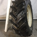18.4/R34 Goodyear Farm Super Traction Radial R-1W on New Holland White 8-Hole Rim with Clamp/Loop Style 60%