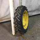8.3/-24 BKT Tires TR 135 Drive R-1 on John Deere Yellow 8-Hole Rim with Clamp/U-Clamp (groups of 2 bolts) 65%