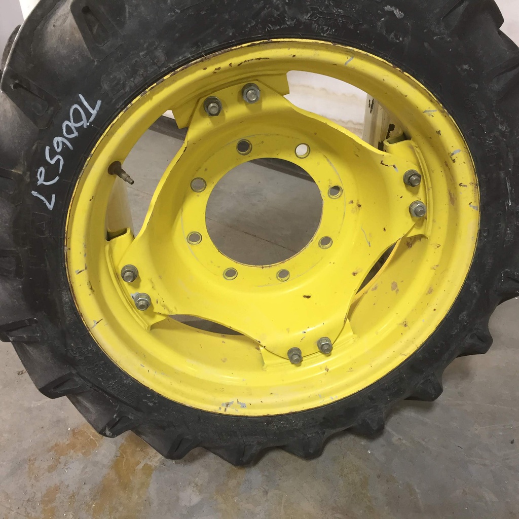 8.3/-24 BKT Tires TR 135 Drive R-1 on John Deere Yellow 8-Hole Rim with Clamp/U-Clamp (groups of 2 bolts) 65%