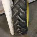 8.3/-24 BKT Tires TR 135 Drive R-1 on John Deere Yellow 8-Hole Rim with Clamp/U-Clamp (groups of 2 bolts) 65%