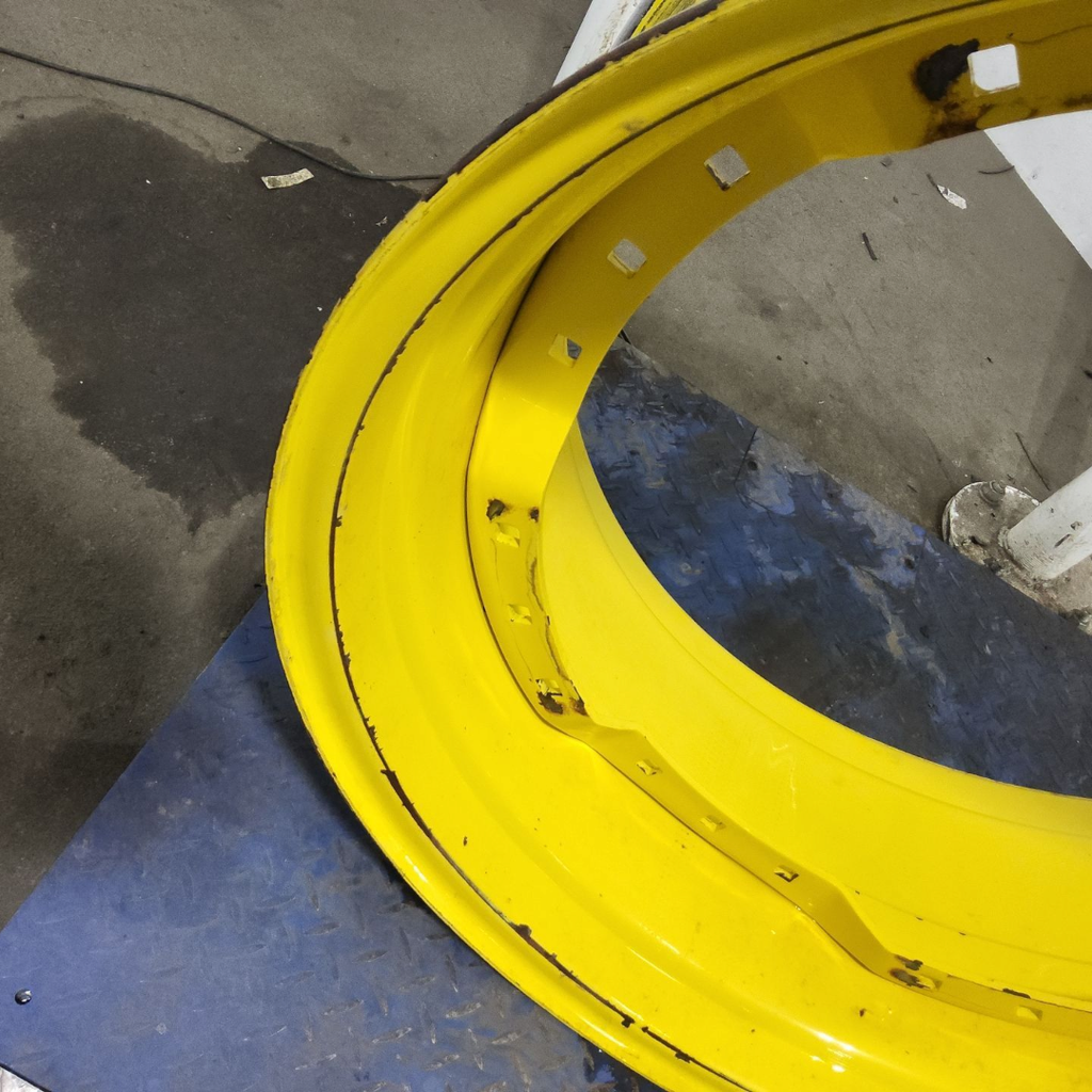 15"W x 34"D, John Deere Yellow 12-Hole Waffle Wheel (Groups of 3 bolts)