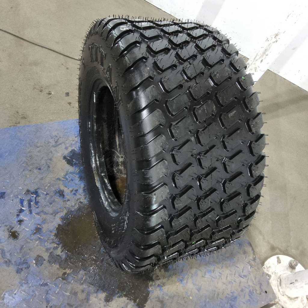 31x13.50-15NHS Titan Farm Multi Trac C/S HF-1 F (12 Ply)