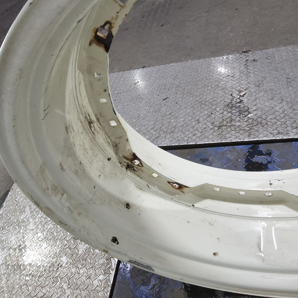 15"W x 34"D, New Holland White 12-Hole Waffle Wheel (Groups of 3 bolts)