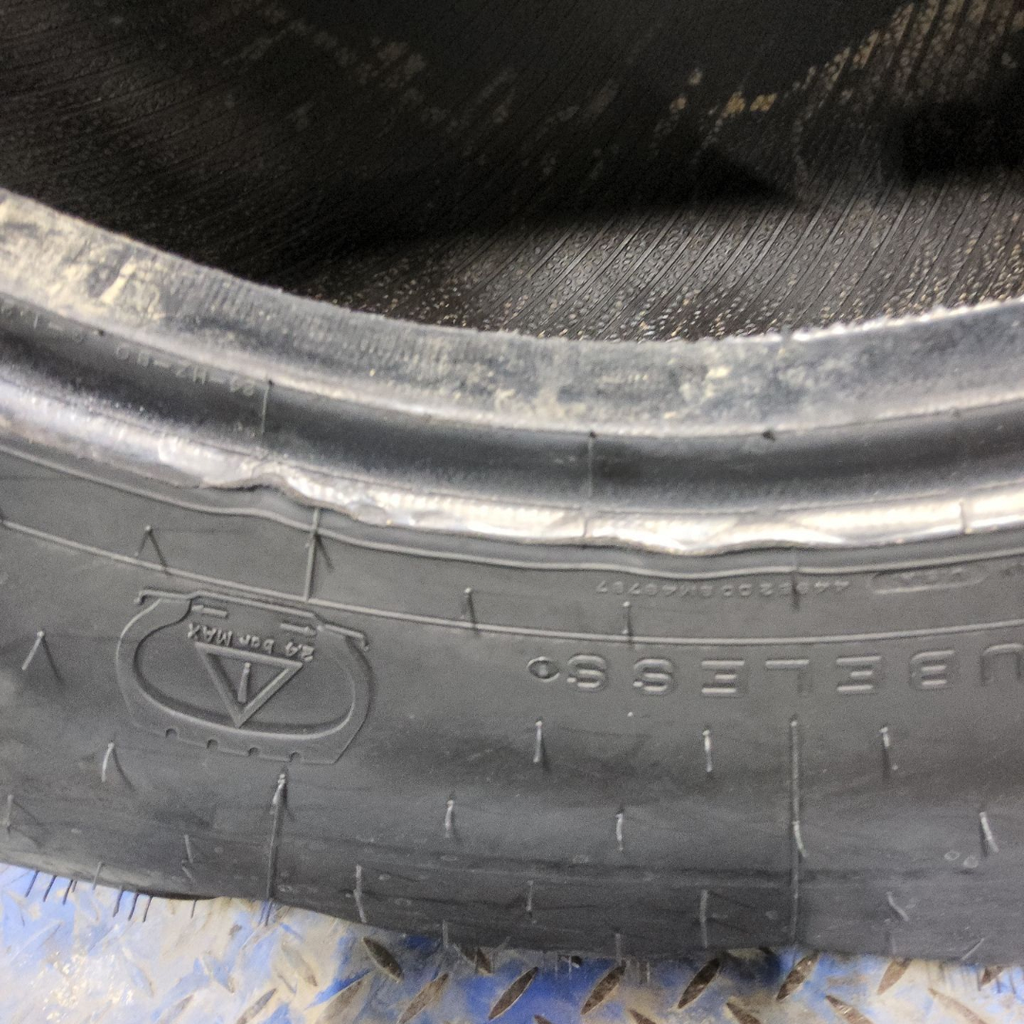 21L-24 Firestone All Traction Utility R-4 F (12 Ply), 99%