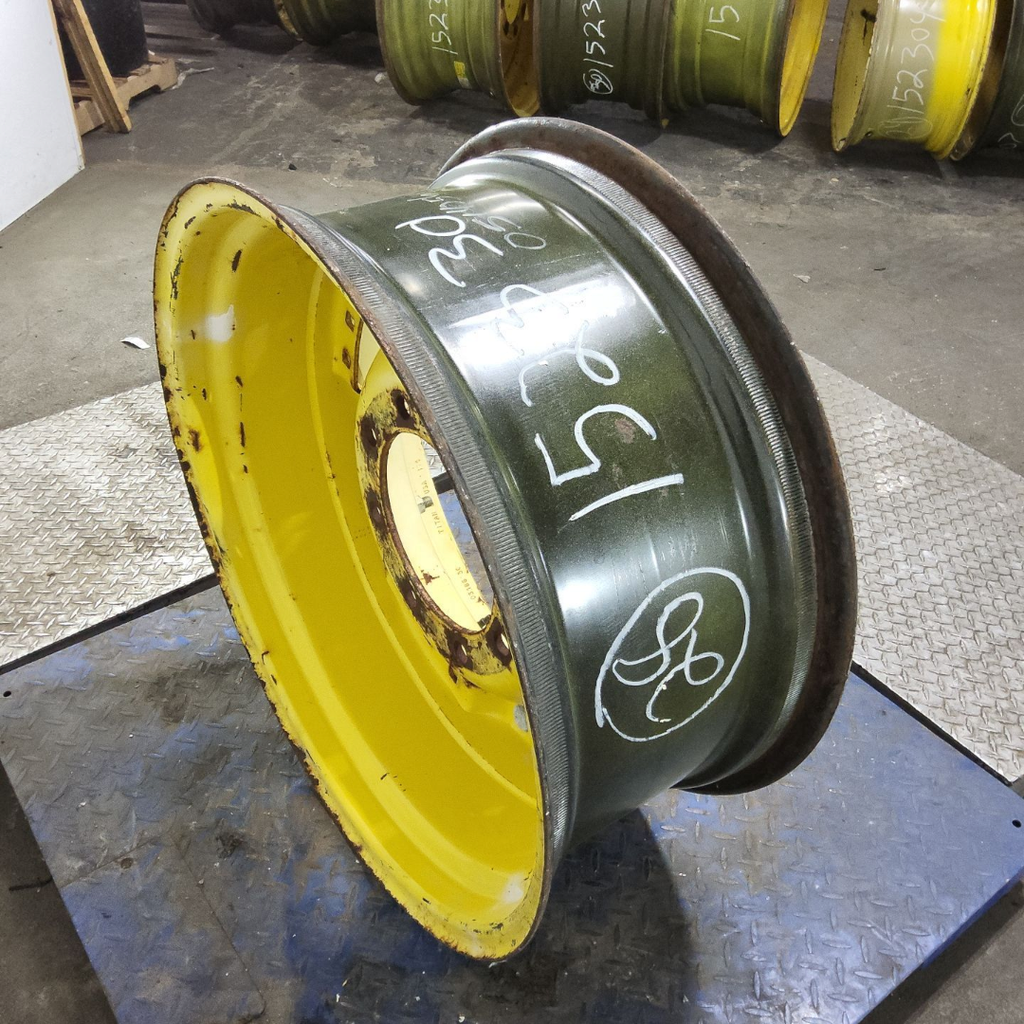 12"W x 28"D, John Deere Yellow 12-Hole Waffle Wheel (Groups of 3 bolts)