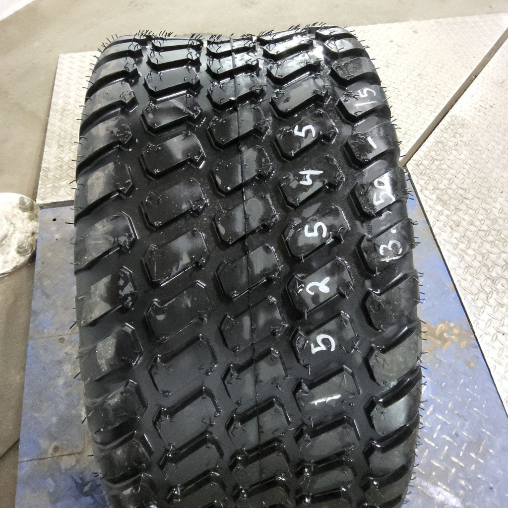 31x13.50-15NHS Titan Farm Multi Trac C/S HF-1 F (12 Ply), 99%