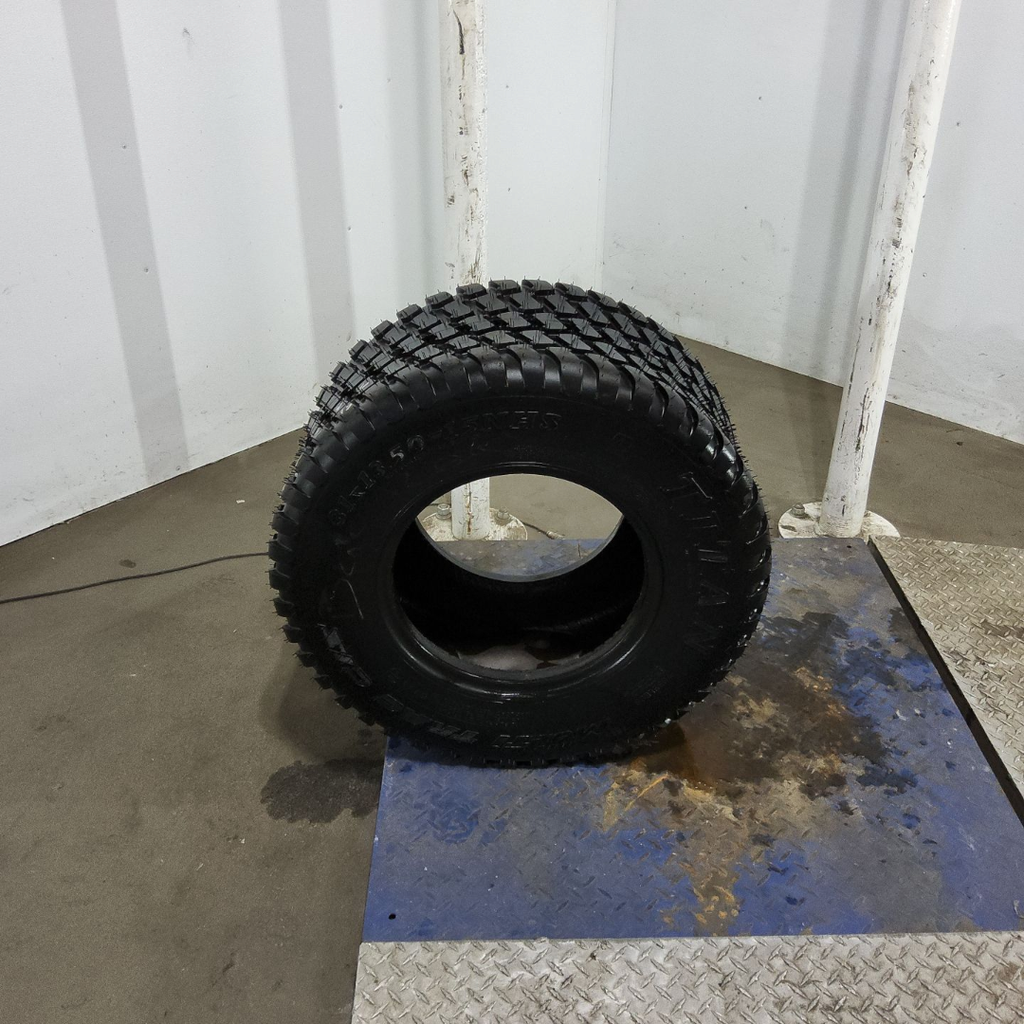 31x13.50-15NHS Titan Farm Multi Trac C/S HF-1 F (12 Ply), 99%