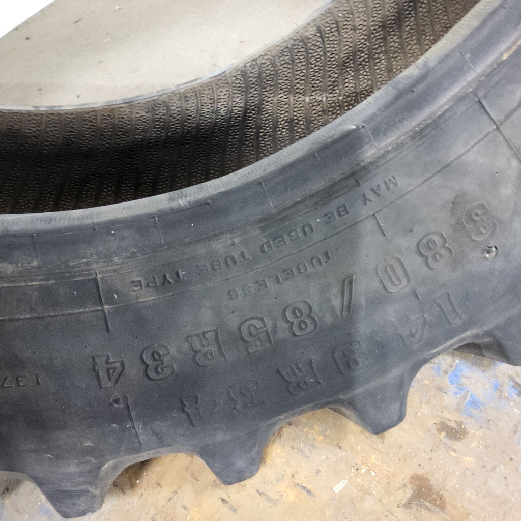 14.9R34 Firestone Radial All Traction FWD R-1 137A8 80%